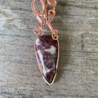 Pendant made of Rubellite Tourmaline in Quartz teardrop stone in rose gold wrap; .75" w x 2 5/8" h, incl bail