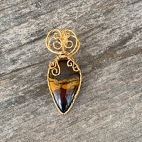 Pendant made of Natural Desert Jasper Teardrop stone with gold wire wrap; 7/8" w x 2" long, incl bail