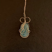 Pendant made of Turquoise Oval Fuchsite Stone w/ silver wrap; 1" x 2.25" incl bail