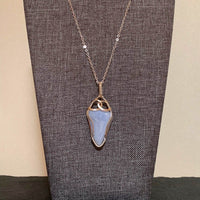 Pendant made of Blue Lace Agate with silver wrap; 1" w x 2 3/8" h incl bail