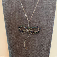 Pendant made of Dragonfly shaped copper wire with with turquoise seed beads; 2.25" w x 2.75" h, incl bail