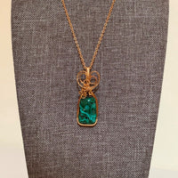 Pendant made of Chrysocolla Malachite stone with gold wrap; 8/5" w x 2" h, incl bail