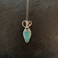 Pendant made of Amazonite Teardrop Stone with silver wire wrap; .75' w x 21/8" long, incl bail