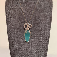 Pendant made of Amazonite Teardrop Stone with silver wire wrap; .75' w x 21/8" long, incl bail