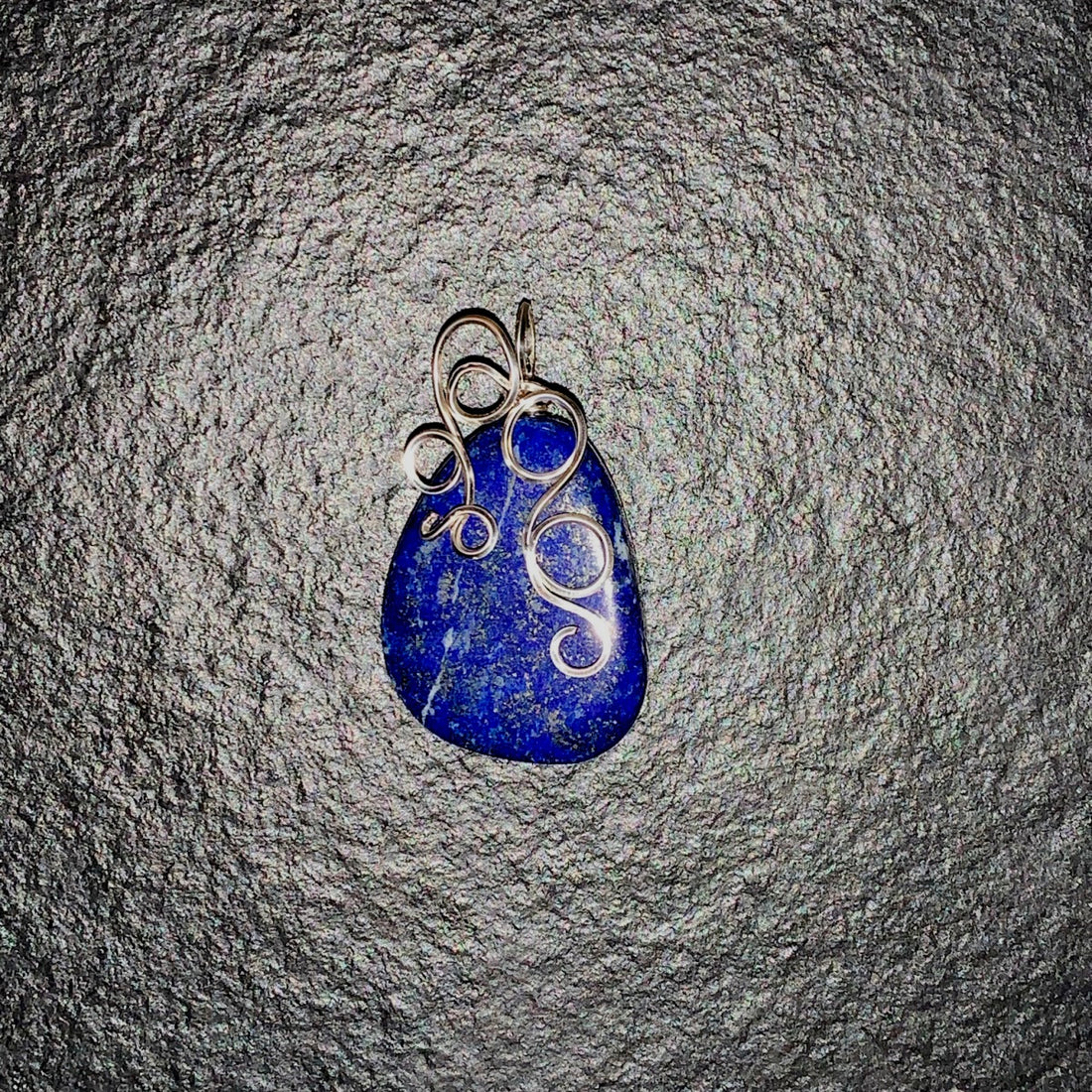 Lapis Lazuli Triangular Nugget with Silver wire wrap; 1" w x 1.75" long incl bail