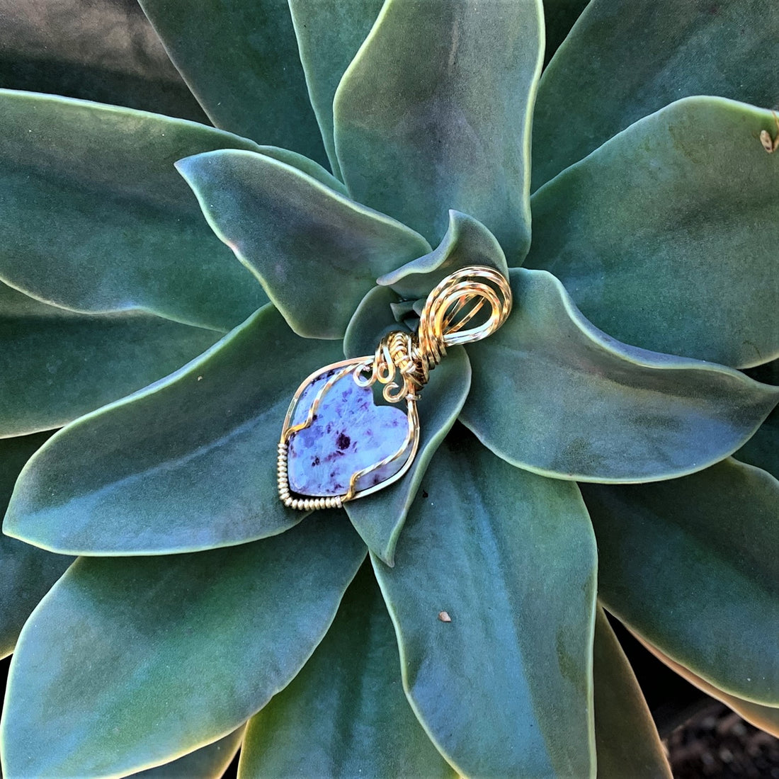 Kammererite Heart Pendant with god wire wrap; 3/4" w x 1 7/8" long, incl bail