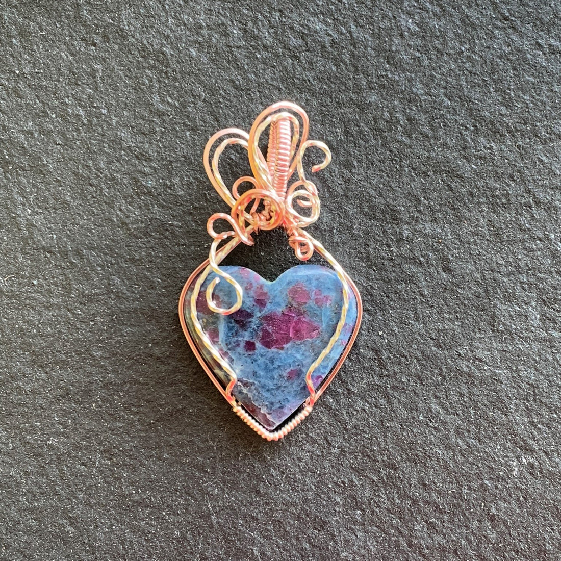 Ruby Kyanite Heart stone with silver & rose gold wire wrap; 1.25" w x 2.25" long incl bail