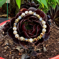 A bracelet made of Round Jasper with gold crystals & spacers