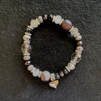 A bracelet made of Botswana round beads with crystal rondels