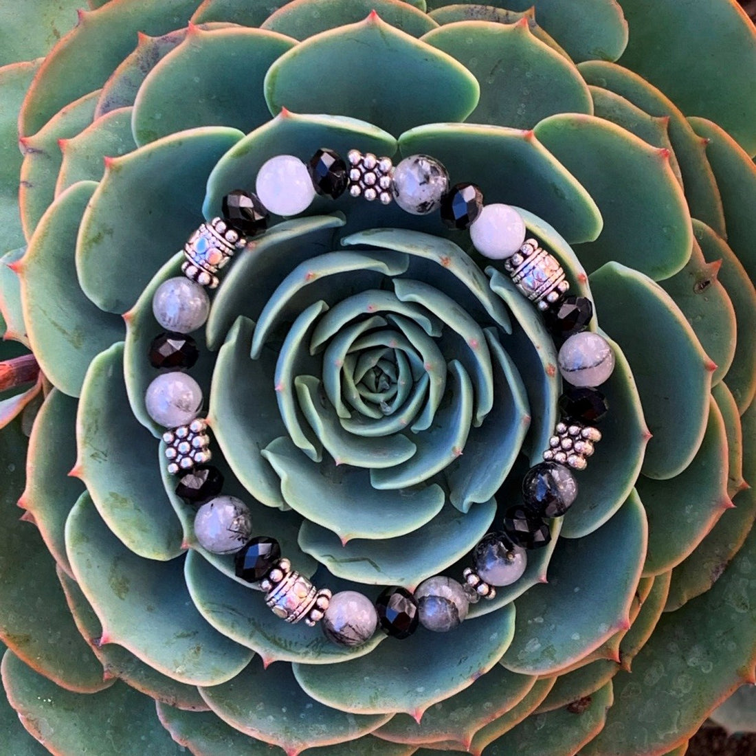 A bracelet made of Black Toumaline with black rondels & antique silver beads