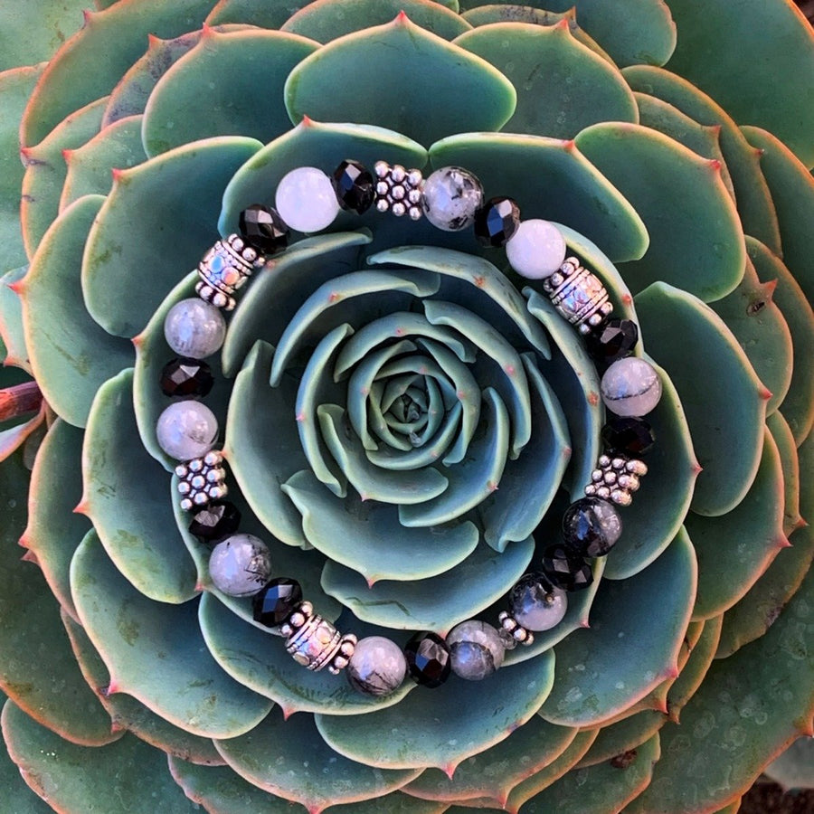 A bracelet made of Black Toumaline with black rondels & antique silver beads