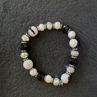 A bracelet made of Zebra Jasper with silver cyrstals on elastic