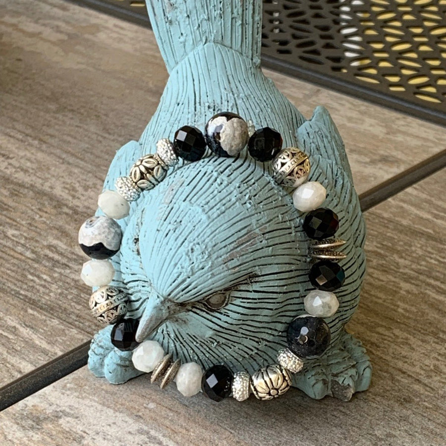 A bracelet made of Zebra Jasper with b&w rondels and silver beads on elastic