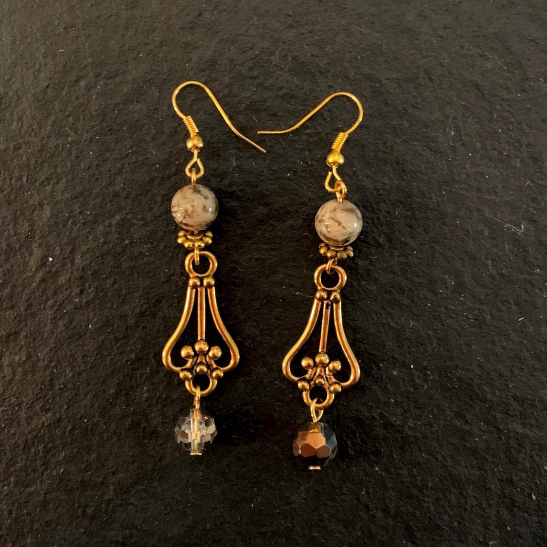 Earrings made of Jasper round beads with antique gold drop