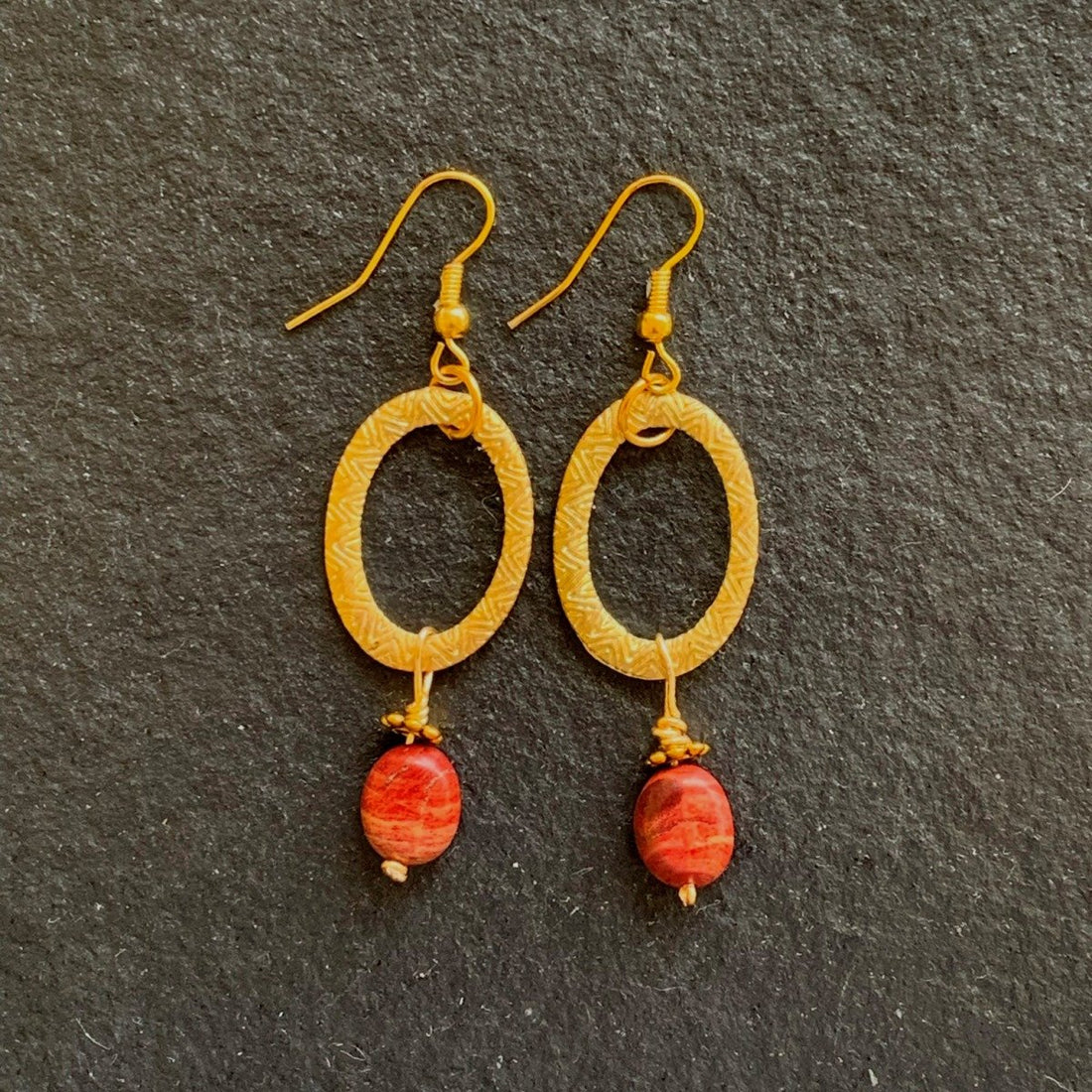 Earrings made of Red Poppy Jasper Nuggets in copper wire wrapped hoop