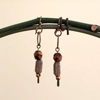Earrings made of Bronze crystal with bronze dangle & gold barrel bead