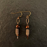 Earrings made of Bronze crystal with bronze dangle & gold barrel bead