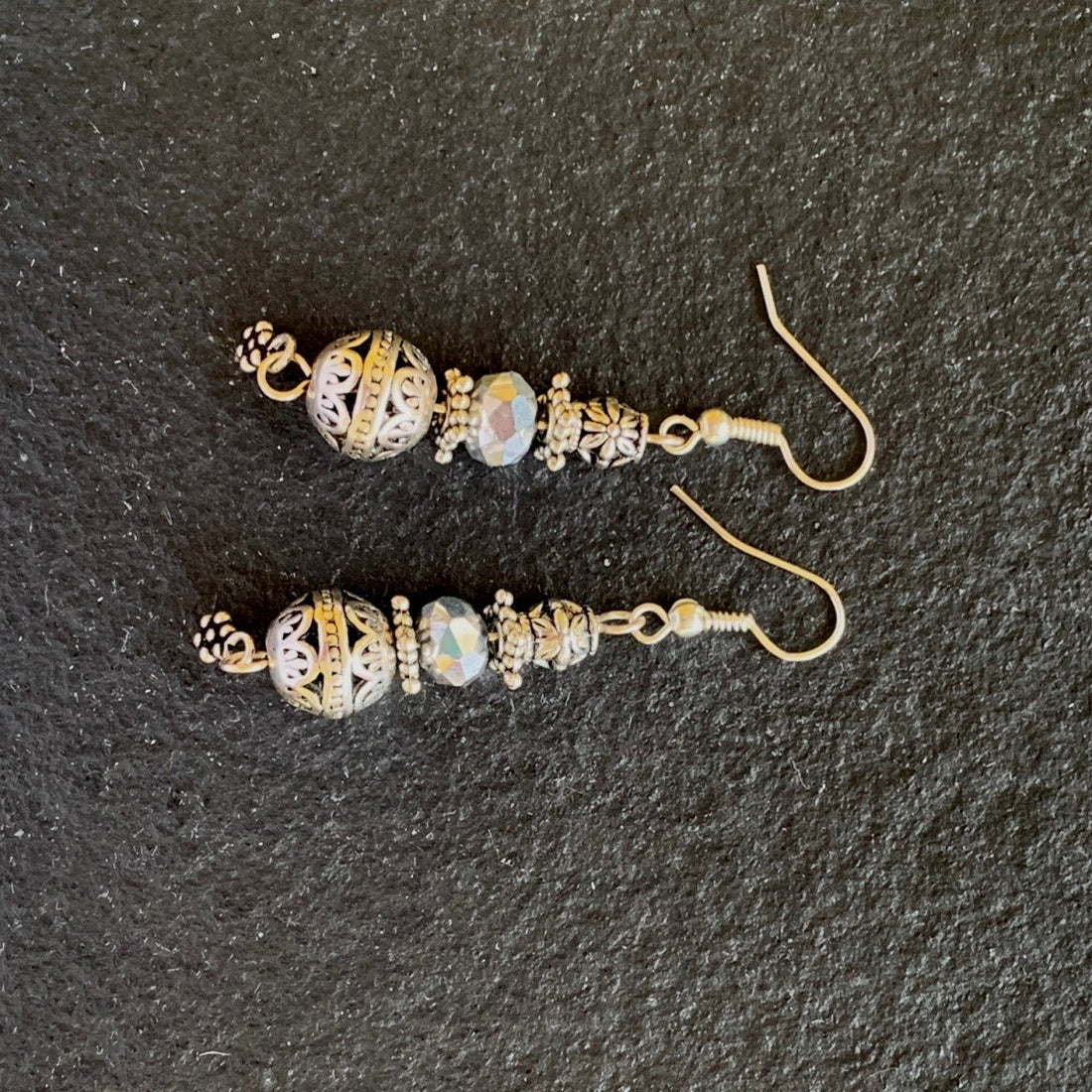 Earrings made of Antique silver round beads with crystal rondels