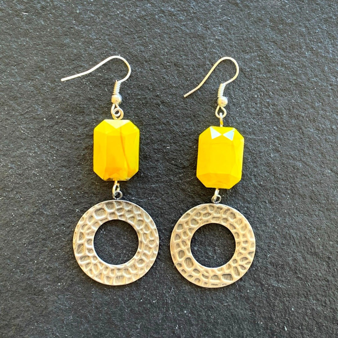 Earrings made of Yellow crystal rectangles with silver hammered accent