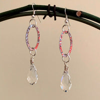 Earrings made of Silver hammered ovals with clear crystal briolettes
