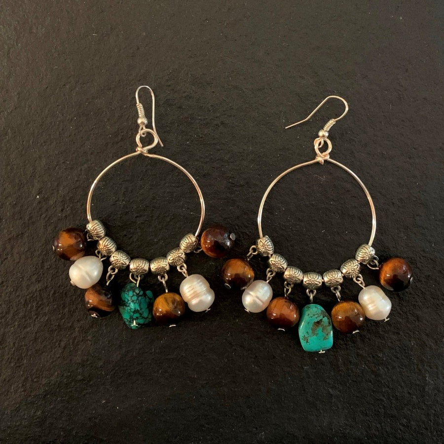 Earrings made of Tiger Eye rounds, fresh water pearls, & turquoise nugget on hand made wire hoop with silver beads