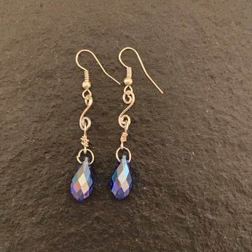 Earrings made of Light Blue crystal Briolettes with silver swirl