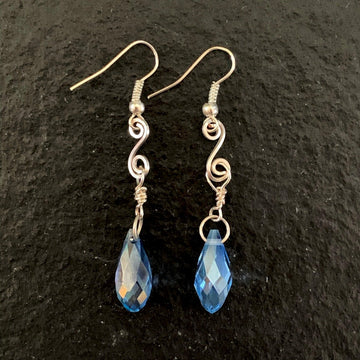 Earrings made of Dark Blue crystal Briolettes with silver swirl