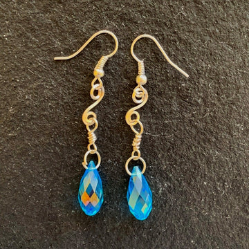 Earrings made of Turquoise crystal Briolettes with silver swirl