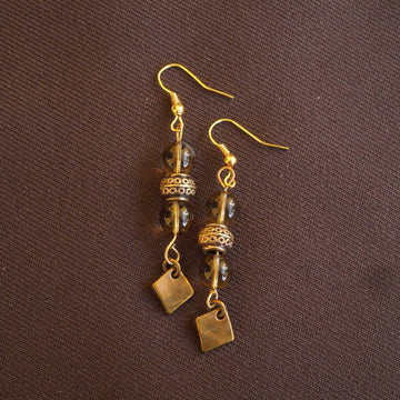 Earrings made of Round Smoky Quartz with antique gold accents