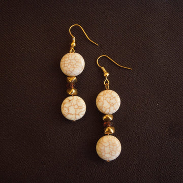 Earrings made of Natural Magnesite coin beads with gold accents