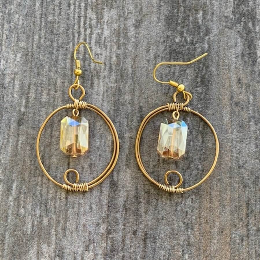 Earrings made of Rectangular Faceted Crystals in gold wrapped hoop