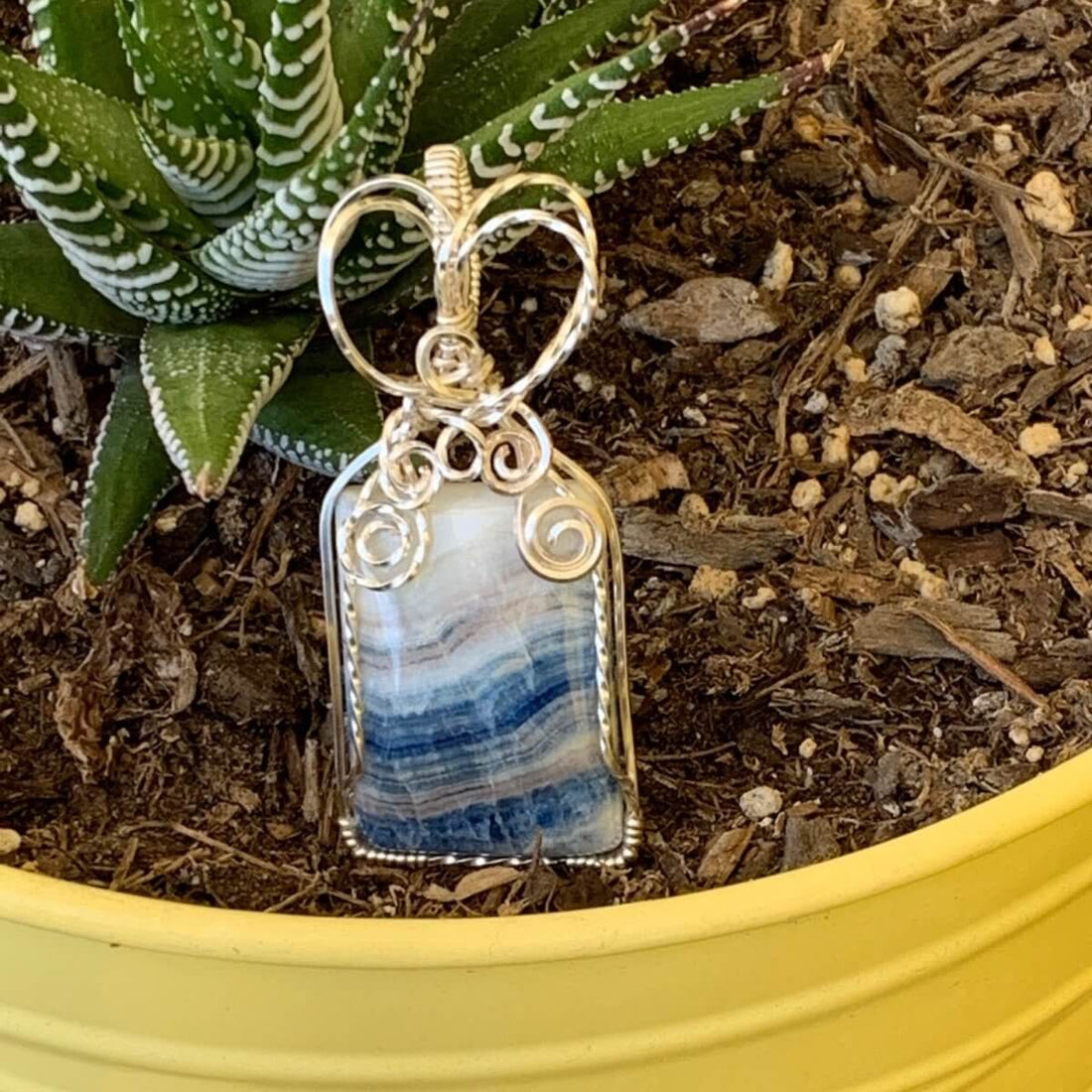 Pendant made of Stichtite Square blue & white stone with silver wire wrap; 1" w x 2.25" l, incl bail