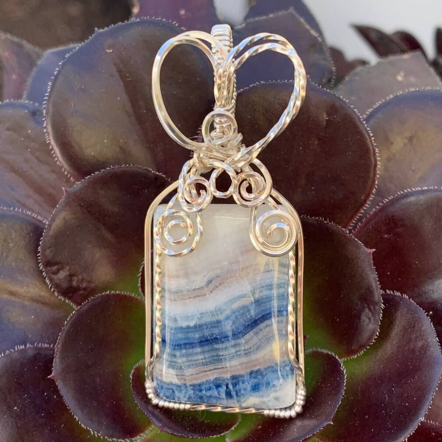 Pendant made of Stichtite Square blue & white stone with silver wire wrap; 1" w x 2.25" l, incl bail