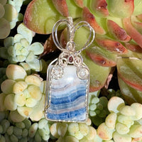 Pendant made of Stichtite Square blue & white stone with silver wire wrap; 1" w x 2.25" l, incl bail