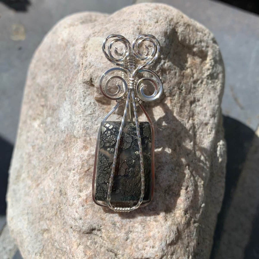 Pendant made of Marcasite Rectangle stone with silver wire wrap; .75" w x 2" long incl bail