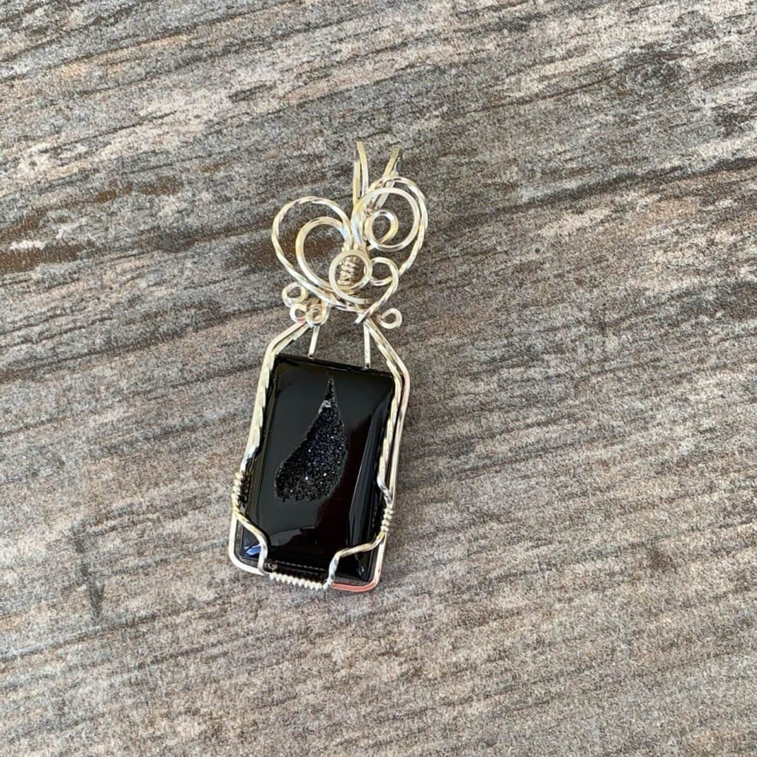 Pendant made of Black Onyx Druzy Rectangle with silver wire wrap; 7/8" w x 2 3/8" long, incl bail