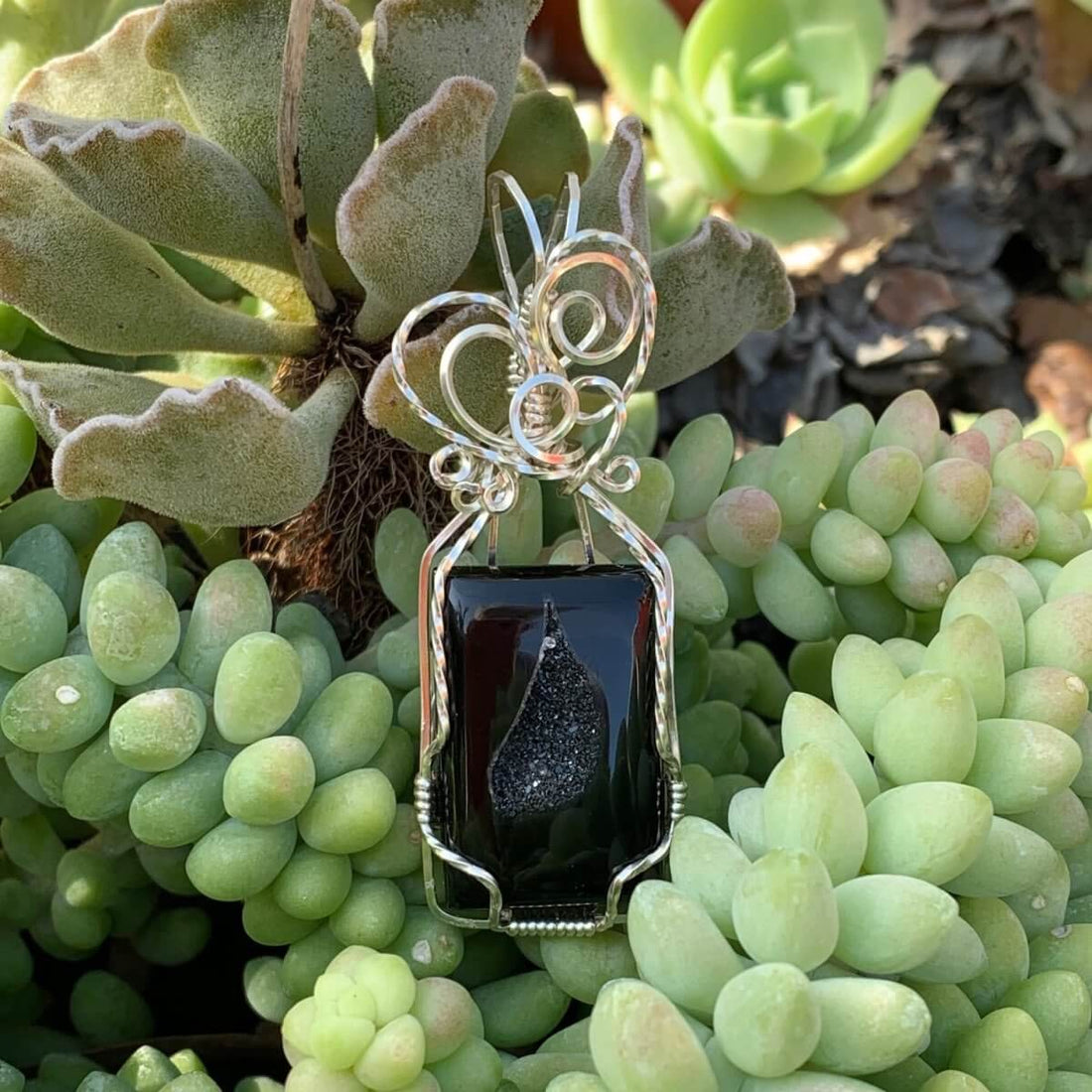 Pendant made of Black Onyx Druzy Rectangle with silver wire wrap; 7/8" w x 2 3/8" long, incl bail