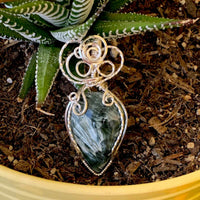 Pendant made of Natural Seraphinite Teardrop stone with Silver wire wrap; 1" w x 2 1/8" long, incl bail