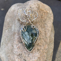 Pendant made of Natural Seraphinite Teardrop stone with Silver wire wrap; 1" w x 2 1/8" long, incl bail