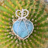 Pendant made of Amanzonite Heart stone with Silver wire wrap; 1.25" w x 1.75" long, incl bail