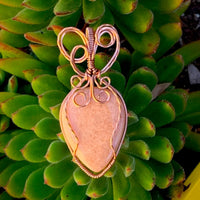Pendant made of Peach Amazonite Teardrop stone with copper wire wrap; 1" w x 2 3/8" long, incl bail