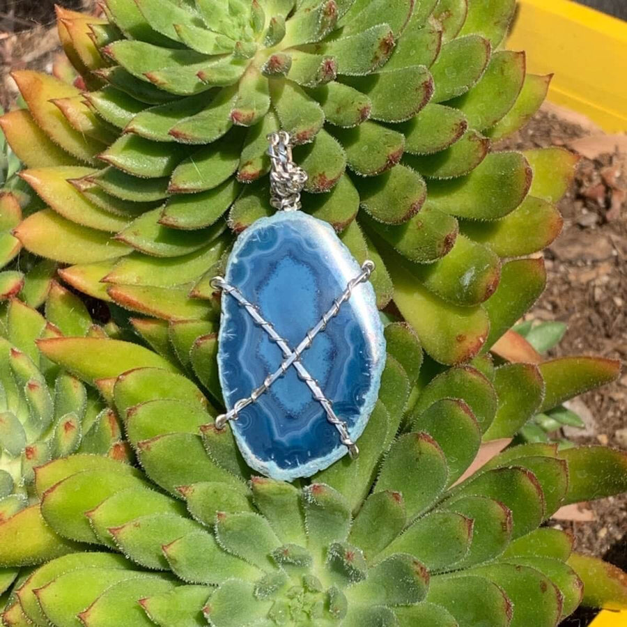 Pendant made of Oval Agate Slice with Silver Wire wrap; 1" w x 2 1/8" long incl bail