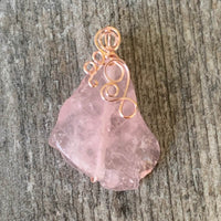 Pendant made of Rose Quartz Nugget with Rose Gold Wrap; 1 3/8" w x 21/8" h, incl bail