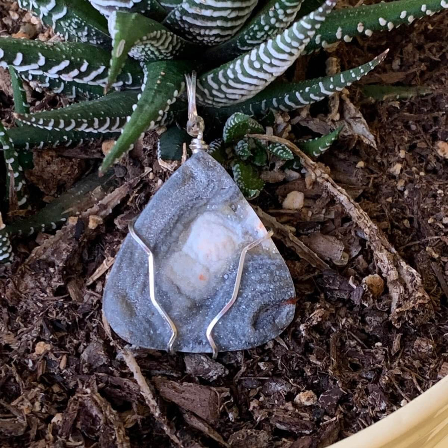 Pendant made of Natural Desert Druzy with silver wire wrap; 1 3/8" w x 2" long, incl bail