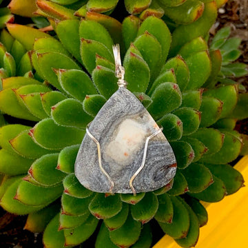 Pendant made of Natural Desert Druzy with silver wire wrap; 1 3/8" w x 2" long, incl bail