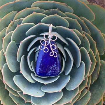 Pendant made of Lapis Lazuli Triangular Nugget with Silver wire wrap; 1" w x 2" long incl bail