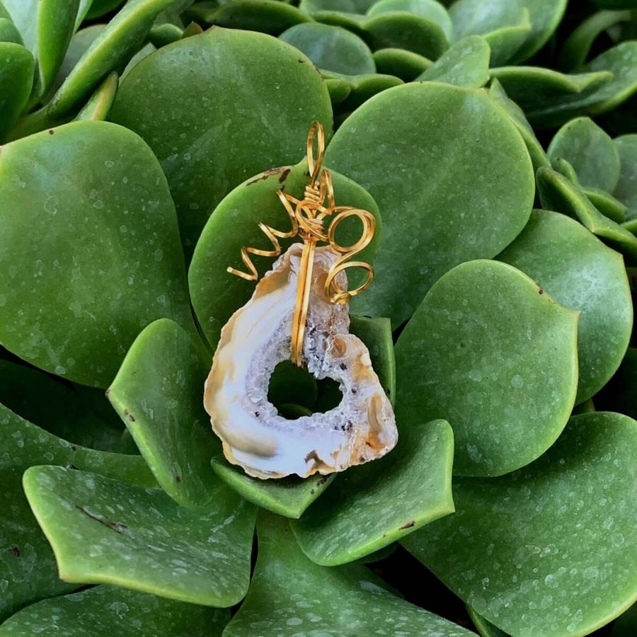 Pendant made of Gold & White Agate Geode w/gold wrap; 1.25" x 2.25" incl bail