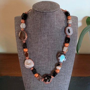 A necklace made of Agate Nuggets with rough edges, black & white rectangle agates and Copper beads