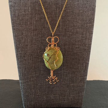 Pendant made of Lemon Chrysoprase oval stone w/ gold wrap; 1.1" x 3" incl bail