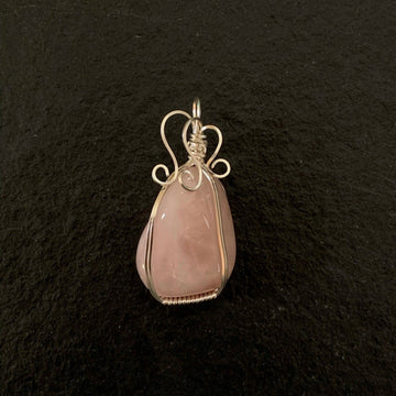 Pendant made of Rose Quartz Freeform w/ silver wrap; 1" x 2.1" incl bail